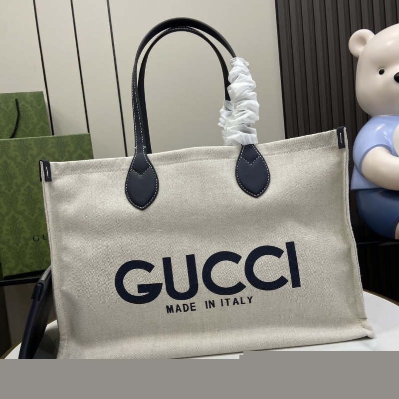 G*u*i shopping bags
